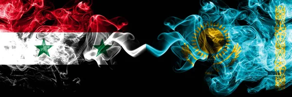 Syria vs Kazakhstan, Kazakhstani smoke flags placed side by side. Thick colored silky smoke flags of Syrian and Kazakhstan, Kazakhstani — Stock Photo, Image