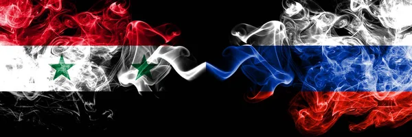 Syria vs Russia, Russian smoke flags placed side by side. Thick colored silky smoke flags of Syrian and Russia, Russian — Stock Photo, Image