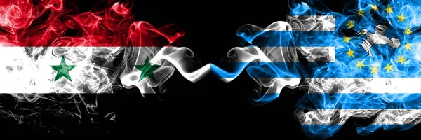 Syria vs South Cameroon smoke flags placed side by side. Thick colored silky smoke flags of Syrian and South Cameroon — Stock Photo, Image