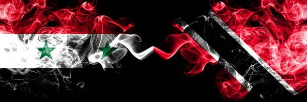 Syria vs Trinidad and Tobago smoke flags placed side by side. Thick colored silky smoke flags of Syrian and Trinidad and Tobago — Stock Photo, Image