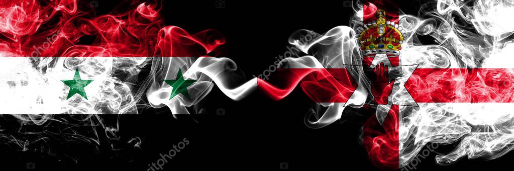 Syria vs Northern Ireland smoke flags placed side by side. Thick colored silky smoke flags of Syrian and Northern Ireland