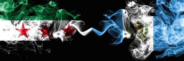 Syrian Arab Republic vs Guatemala, Guatemalan smoke flags placed side by side. Thick colored silky smoke flags of Syria opposition and Guatemala, Guatemalan — Stock Photo, Image