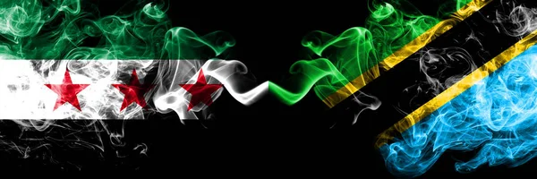Syrian Arab Republic vs Tanzania, Tanzanian smoke flags placed side by side. Thick colored silky smoke flags of Syria opposition and Tanzania, Tanzanian — Stock Photo, Image