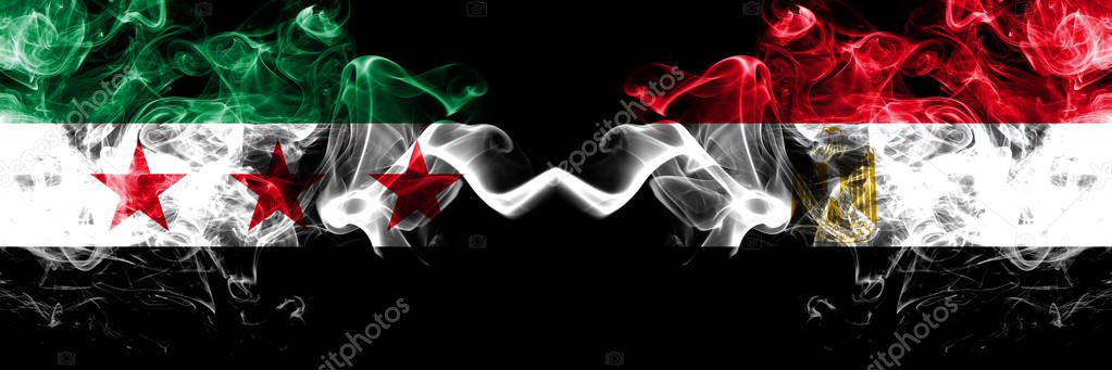 Syrian Arab Republic vs Egypt, Egyptian smoke flags placed side by side. Thick colored silky smoke flags of Syria opposition and Egypt, Egyptian