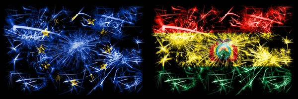 Eu, Unia Europejska vs Boliwia, Boliwijski Nowy Rok świętuje musujące flagi fajerwerków tle koncepcji. Połączenie dwóch bander państw. — Zdjęcie stockowe