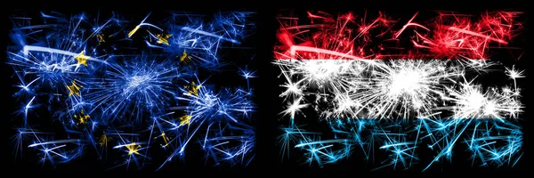欧云，欧盟对卢森堡新年庆祝闪耀烟花旗帜概念背景。 两个州旗的合并. — 图库照片