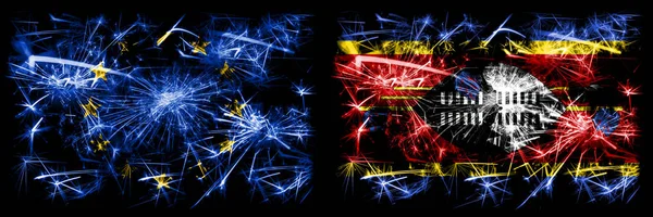 UE, Unión Europea vs Swazilandia, Swazilandia celebración de año nuevo brillante banderas de fuegos artificiales concepto de fondo. Combinación de dos banderas de estados . — Foto de Stock