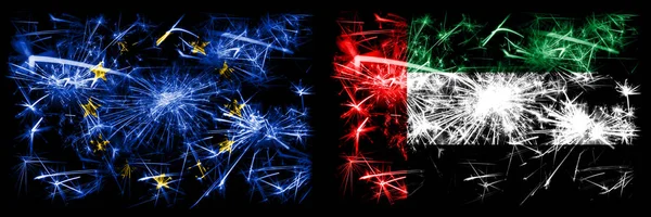 Europa, Europeiska unionen mot Förenade Arabemiraten, Emirati nyårsfirande gnistrande fyrverkerier flaggor koncept bakgrund. Kombination av två flaggstater. — Stockfoto