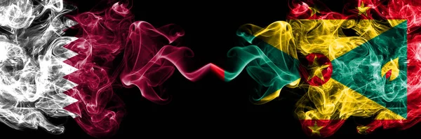 Katar, Grenada 'ya karşı yan yana yerleştirilmiş gizemli bayraklar. Kalın renkli ipeksi soyut duman bayrakları.