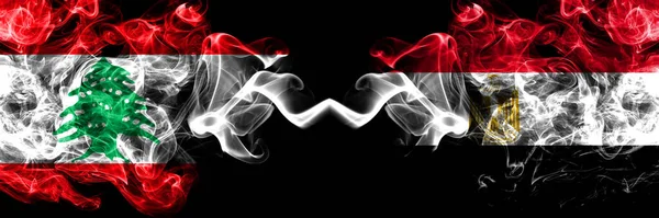 Ливан Против Египта Египетские Дымящиеся Мистические Флаги Размещенные Бок Бок — стоковое фото