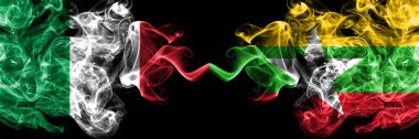 İtalya, Myanmar 'ın dumanlı mistik bayraklarına karşı yan yana. İtalyan ve Myanmar 'ın kalın renkli, ipeksi, soyut duman bayrakları.