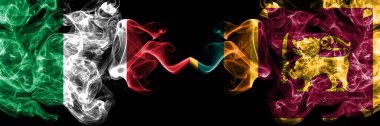İtalya, Sri Lanka 'ya karşı, Sri Lankalı dumanlı mistik bayraklar yan yana yerleştirildi. İtalyan ve Sri Lanka, Sri Lankalı kalın renkli, ipeksi, soyut duman bayrakları.