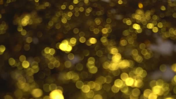 Goldener Glitzerhintergrund verschwommen — Stockvideo