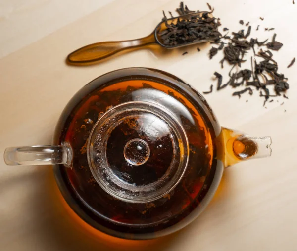 Top view of brewed indian black hot tea in teapot — Stock Photo, Image