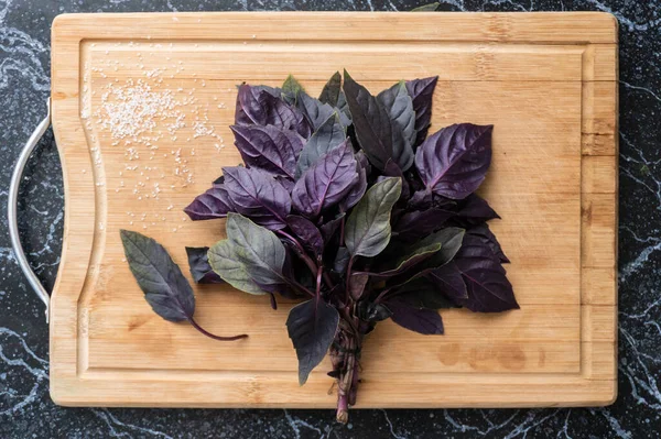 Top view on bunch of purple basil leafs on the board — Stock Photo, Image