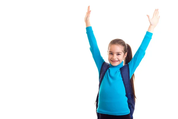 Joyeux écolière avec sac avec les mains en l'air — Photo