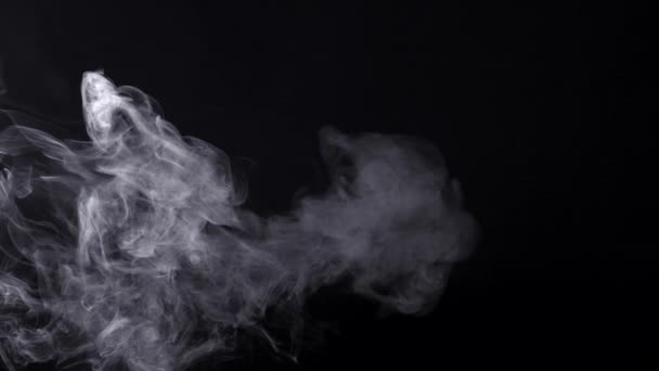 Smoke over balck background. Slow motion. — Stock Video