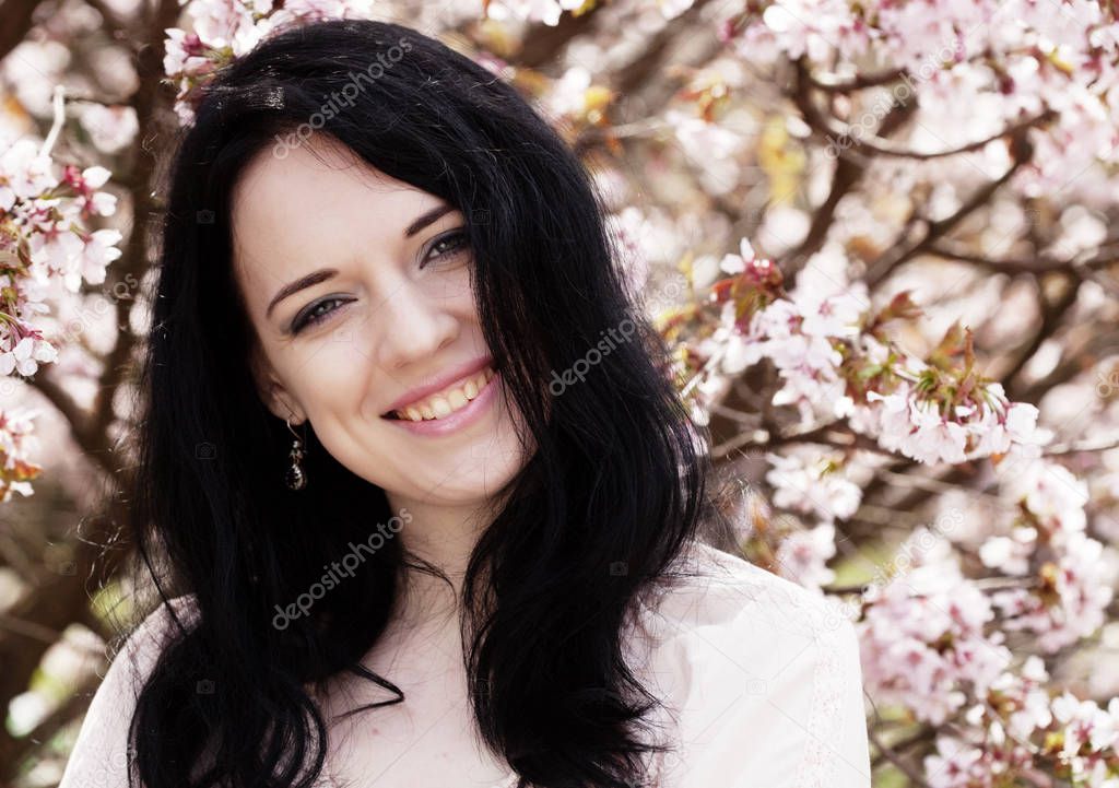 lifestyle and people concept: Young woman happy smiling enjoying spring summer day