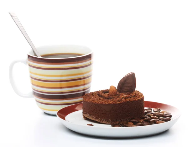 Tårta med en kopp kaffe på nära håll — Stockfoto