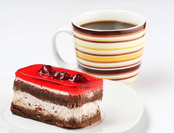 Bir fincan kahve ile kek yakın çekim — Stok fotoğraf