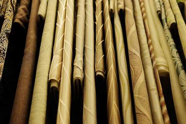 Rolls of fabric and textiles in store — Stock Photo, Image