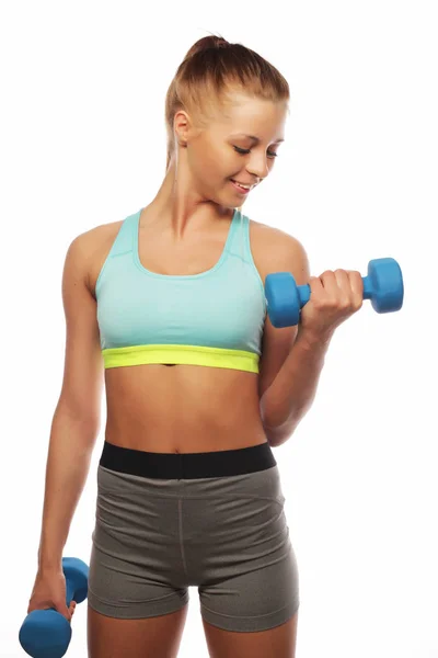 Sport, Fitness and People concept: Woman in sport equipment practice with hand weights isolated on white background — Stock Photo, Image