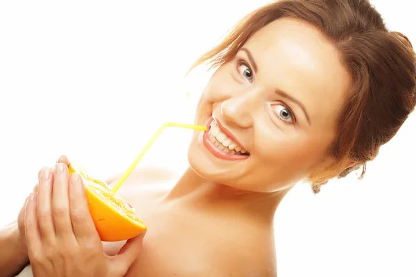 Beautiful young woman drinking juice with straw — Stock Photo, Image