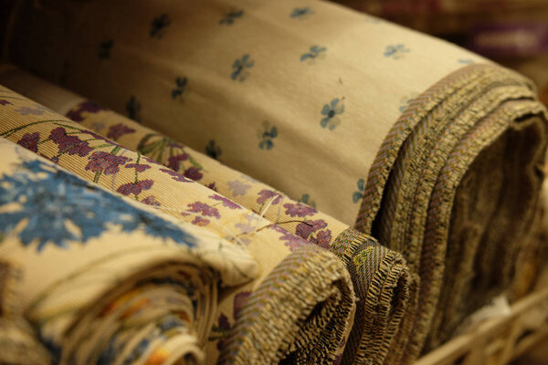 Sale - colorful fabrics in the store, close up