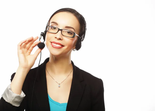 Operadora de atención al cliente femenina con auriculares y sonrisa — Foto de Stock