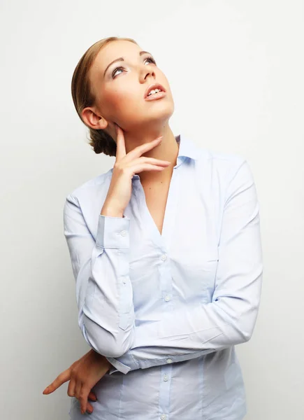 Retrato de una joven mujer de negocios sobre fondo blanco —  Fotos de Stock