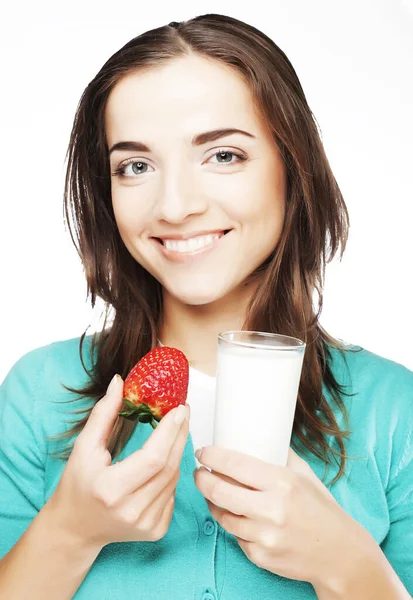 Woman with milk and strawberry Stock Picture