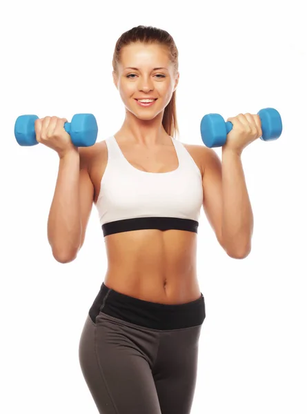 Woman in sport equipment practice with hand weights — Stock Photo, Image