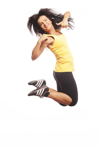 喜びのジャンプするフィットネス女性. — ストック写真