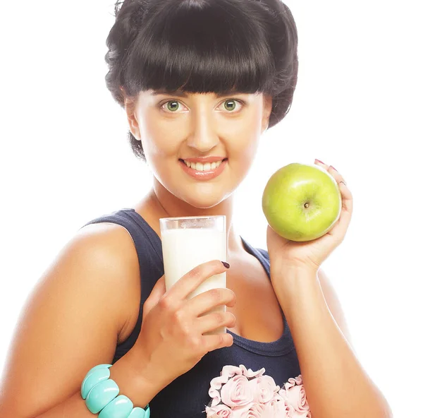 Mujer con manzana y leche — Foto de Stock