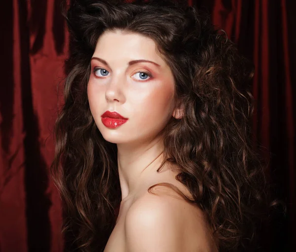 Image of beautiful young woman with curly hair — Stock Photo, Image