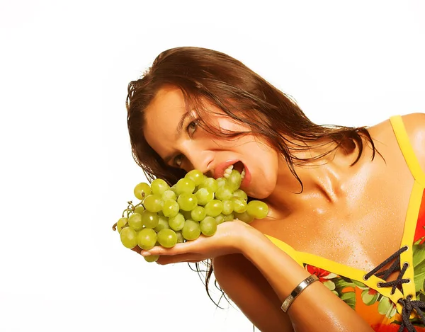 Mulher com cacho de uvas — Fotografia de Stock