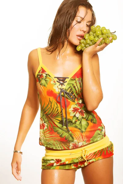 Woman with bunch of grapes — Stock Photo, Image