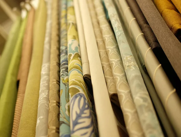 Rolls of fabric and textiles in store — Stock Photo, Image