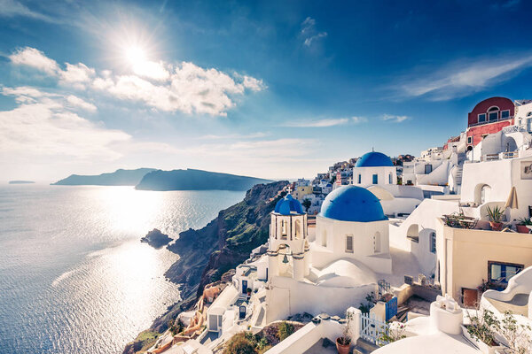 Churches in Oia, Santorini island in Greece, on a sunny day.