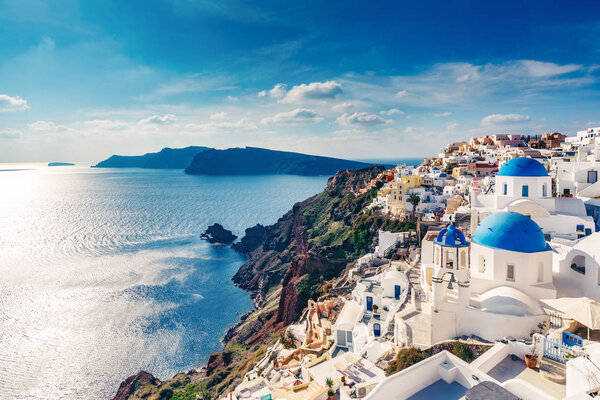 Churches in Oia, Santorini island in Greece, on a sunny day.