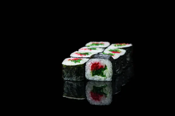 Sushi Roll On A Black Background reflection . Japanese food. Close Up. — Stock Photo, Image