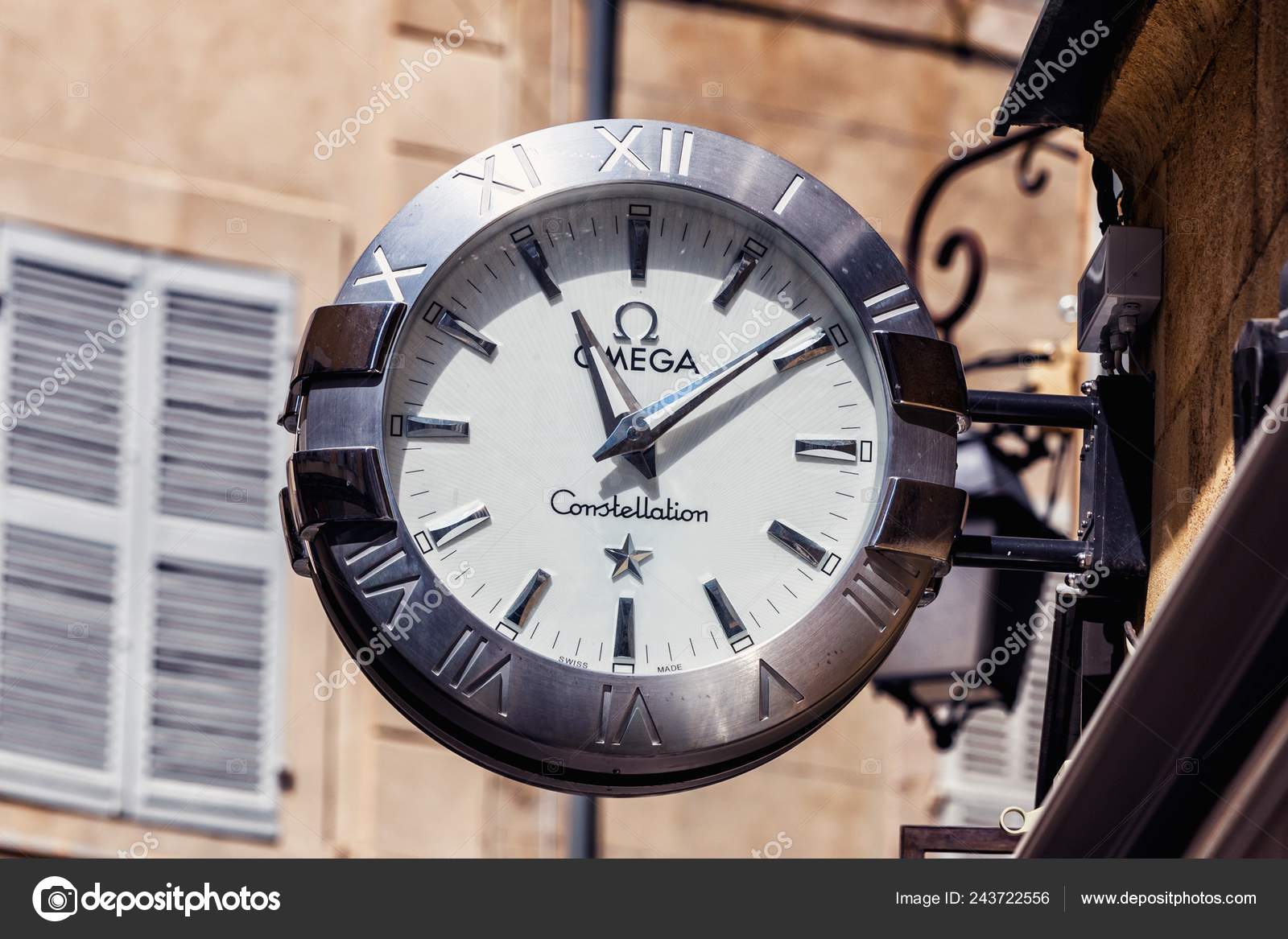 omega wall clock