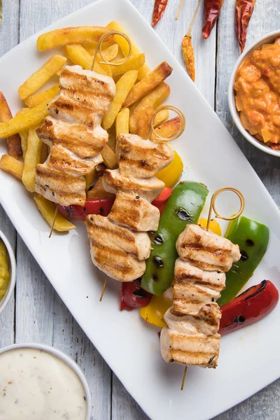 Grilled chicken meat on skewer — Stock Photo, Image