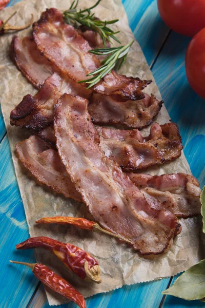 Slices of fried bacon — Stock Photo, Image