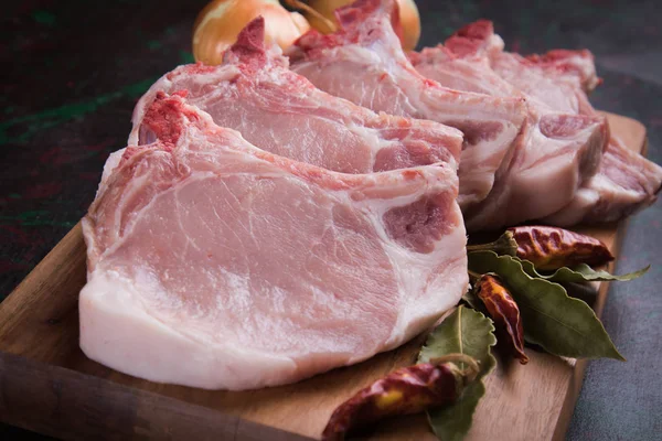 Raw pork loin chops