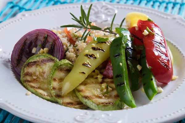 stock image Grilled red, green and yellow peppers