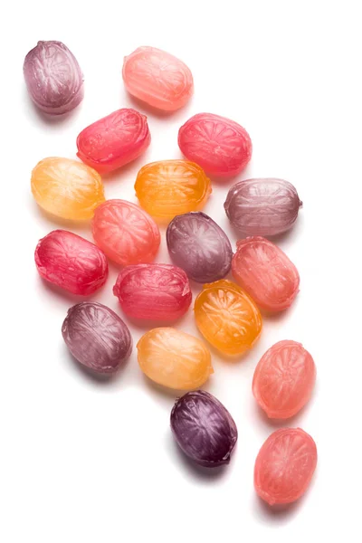 Tvrdé bonbony nad bílým pozadím — Stock fotografie