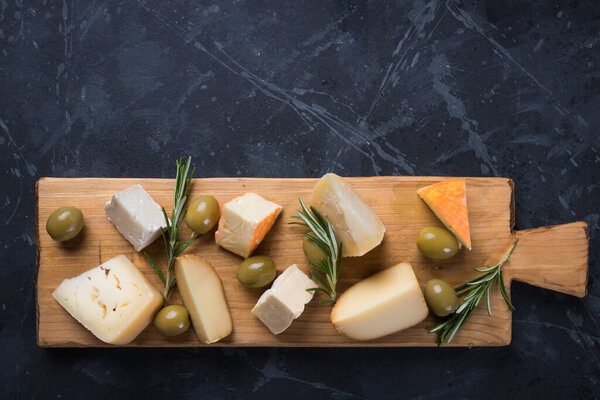 Cheese platter with blue, aged, yellow and white cheeses