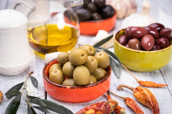 Pickled olives ready to eat, healthy food used in mediterranean cuisines