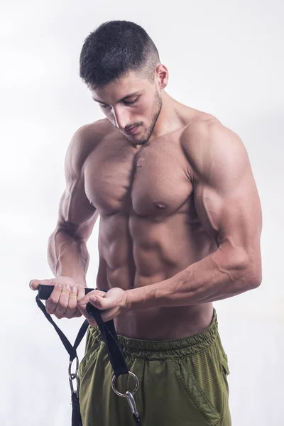 Ein Junger Muskulöser Mann Der Seinen Körper Mit Einer Zugstange — Stockfoto